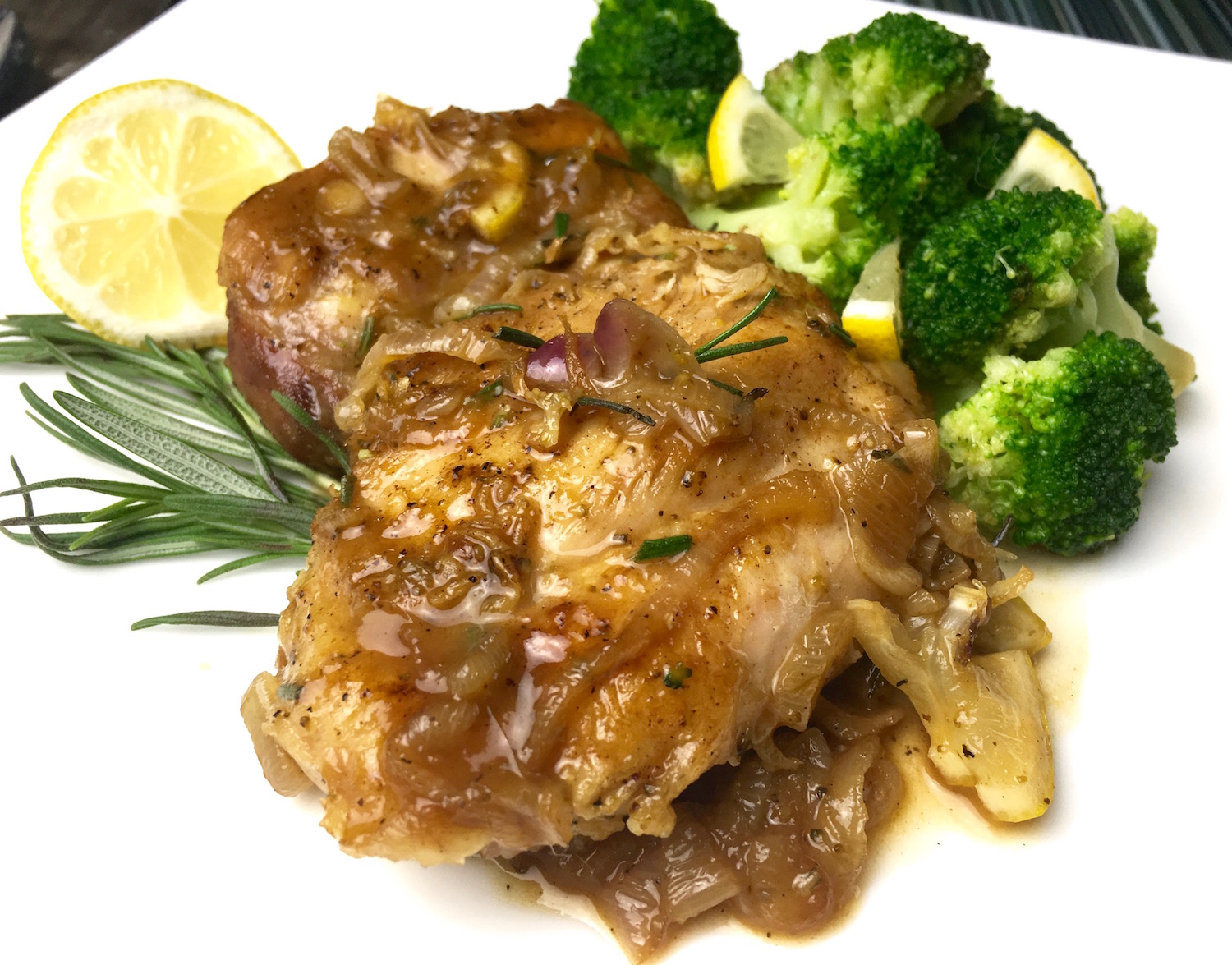 Lemon Chicken with Broccoli served on a plate.